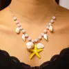 Collar de conchas y perlas estilo resort costero transfronterizo, moderno y versátil, collar de concha y estrella de mar exquisito de alta gama de nicho
