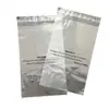 En stock bolsa autoadhesiva de PE inglés con advertencia anti-asfixia bolsillo plano bolsa para huesos bolsa para ropa y calcetines impresión idioma publicitario
