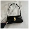 2026 Nova Bolsa de Ombro Vintage com Fecho de Cadeado, Bolsa de Ombro de Alta Qualidade para o Dia a Dia, Bolsa Baguete Versátil e da Moda com Design de Nicho