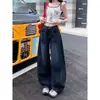 Jeans anchos de calle retro americano para mujer, nuevo diseño 2026, para petite, corte holgado, dobladillo curvo, pantalones de largo hasta el suelo