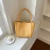 Bolsa tejida superventas transfronteriza, bolso para lonchera con figura de mariposa y hebilla de ocho de moda europea y americana, bolso de hombro grande de gran capacidad hecho a mano para mujer