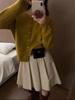 Cárdigan de punto con hebilla dorada de lana de Año Nuevo para mujer 23 otoño e invierno nuevo suéter raglán abrigo top suelto adelgazante