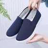Sapatos de lona femininos antiderrapantes confortáveis leves respiráveis sola macia todos os jogos cano baixo novo preto fábrica sapatos de trabalho de pano masculinos e femininos