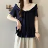 Camiseta de Manga Corta con Cuello en V Talla Grande para Mujer 2026 Nuevo Estilo de Verano con Cintas Fluidas y Volantes Top Básico Reductor de Edad