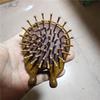 Pente Yibei com airbag pente massageador cuidados com a saúde pente de madeira pente com almofada de ar pente para cachear cabelo dente redondo dente de bambu base de couro cabo redondo Sândalo Dourado