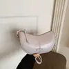 Bolsa de axila feminina de nicho transfronteiriça, novo modelo de verão 2026, simples e versátil para o dia a dia, bolsa de ombro única cruzada estilo bolinho