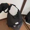 Bolso tote moderno de gran capacidad para mujer, nueva colección 2026, elegante diseño a rayas, estilo japonés, bolso de hombro simple y dulce