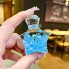 Caja Ciega de Tono Agitable Bolsa Ciega Cuentas de Burbujas Azules Botella Flotante Luminosa Adornos de Arena Movediza Llavero Acrílico Colgante