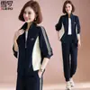 Roupas de Outono da Mamãe 2024 Novo Moletom Solto Tamanho Grande Conjunto de Duas Peças Estilo Ocidental Terno Esportivo para Meia-Idade e Idosos Primavera e Outono Feminino