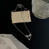 Colar de Prata 999 Banhada com Pingente de Laço de Camada Dupla para Mulheres Design Ins Versátil Pingente de Corrente para Clavícula com Borla de Gota d'Água Dia dos Namorados