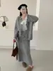 Suéter de punto con flores tridimensionales de encaje empalmado, falda de punto, conjunto de dos piezas, traje nuevo Otoño e Invierno 2025, Tendencia para mujer