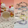 Colgante pequeño de oro puro 999 "Te amo por diez mil años", serie Labubu, con cordón para colgar, un regalo promocional para tiendas de oro