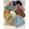 Bolsa de almacenamiento de pana de color liso con cierre de cordón, un juego portátil de tres piezas de gran capacidad y una bolsa de almacenamiento simple