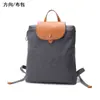 Mochila de Design Novo Original Adequada para Homens e Mulheres, Lona com Detalhes em Couro, Bolsa de Viagem Casual de Cor Sólida, Mochila Escolar