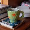 Caneca de Cerâmica para Café Estilo Escandinavo Novo de Xinming Amassada à Mão Assimétrica Pintada à Mão com Flores Xícara de Leite para Café da Manhã