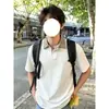 Cuello de camisa estilo americano, polo de retazos texturizado, manga corta para hombre, verano, juvenil, moderno, de alta gama, con solapa, camiseta