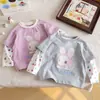 Camiseta Falsa de Dos Piezas con Conejito para Niñas 2026 Nuevo Estilo Primavera/Otoño Versión Coreana Infantil Camiseta Base Patchwork para Niña