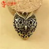 Fábrica de Joyería Yiwu Venta al por mayor Colgante de Búho Hueco 3D Estilo Étnico Retro Artesanía Hueca Adorno para Colgar