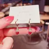 Moda de Año Nuevo estilo occidental estilo chino pendientes con incrustaciones de diamantes para mujer rojo en línea de alta calidad combinan con todo adelgazan la cara pendientes rojos