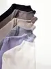 Nova blusa de base feminina para outono e inverno, em malha de mistura de seda e lã, com gola alta, ajuste elástico, design simples e mangas compridas.