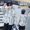 Camisa Estampada Personalizada Infantil Primavera e Outono 2026 Outono Novo Estilo Coreano Legal Moda Bebê Camisa Top Tendência