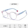 Nuevas monturas de gafas para niños de TR90 con patillas onduladas de silicona suave, gafas de protección ocular para mujer anti luz azul, montura redonda de moda al por mayor