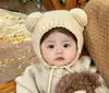 Chapéu de Bebê Estilo Coreano de Inverno Chapéu Fofo para Proteger as Orelhas no Outono e Inverno para Meninos e Meninas Chapéu de Lã Tricotado para Bebê de Um Ano Tendência