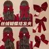 Artículo popular al por mayor transfronterizo de Yiwu: Xiyin accesorio para el cabello rojo brillante para fiesta de compromiso, tocado de boda, pasador de lazo