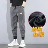 Venda direta no atacado calças masculinas outono e inverno veludo cotelê masculinas forradas com fleece quentes casuais masculinas calças esportivas de bico longas