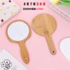 Comercio electrónico transfronterizo orejas de gato creativas espejo de maquillaje portátil de bambú dormitorio de estudiante espejo de mano estilo coreano chica sosteniendo regalo
