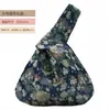 Venta al por mayor del fabricante Empaques de regalo grandes y pequeños Bolsas de regalo de almacenamiento Bolsas de mano con asa única estilo chino para recuerdos