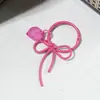 Colgante de Cinta de Lazo Hueco de Aleación de Zinc Pintado en Spray Dulce de Colores Adorno Colgante DIY Accesorio para Cadena de Teléfono Moderno