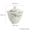 Colaboração Dinastias Tang e Song Mu Cangzhai Argila de Jade Porcelana Branca Tampa de Bambu Pintada à Mão Tigela Conjunto de Chá Kung Fu para Uso Doméstico Tigela de Chá de Cerâmica de Bambu