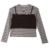 Conjunto de otoño para niñas 2026 nuevo modelo conjunto de dos piezas de imitación con top de retazos a rayas y pantalones cargo para niños venta al por mayor