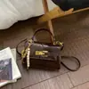 Bolso Pequeño Cuadrado Retro para Mujer 2026 Nuevo Estilo Bolso de Mano de Alta Gama de Moda Bolso de Hombro Versátil Elegante Bolso Cruzado para el Trabajo Moda