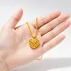El mismo estilo que en las joyerías, colgante de corazón hueco tejido, collar con colgante de corazón chapado en oro vietnamita transfronterizo, color duradero, joyería de Yiwu