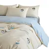 Juego de ropa de cama de cuatro piezas de algodón con bordado 2026 nuevo estampado de dibujos animados funda de edredón de algodón puro juego de ropa de cama de tres piezas para dormitorio cama individual