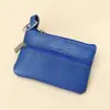 Billetera pequeña de color sólido de piel de vaca de capa superior, monedero portátil, mini ultra-delgada de cuero con cremallera, monedero para mujer, venta directa de fábrica