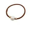 Nueva cuerda para el pelo simple de perlas, diadema, banda elástica, cuerda para la cabeza con cubierta de cuero para mujer, versión coreana de Banda Elástica al por mayor, anillo para el pelo de alta elasticidad