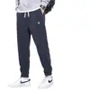 Calças casuais soltas com forro de fleece masculino, calças compridas de veludo cotelê de qualidade de exportação para outono e inverno, calças de moletom jogger quentes para comércio exterior, estilosas
