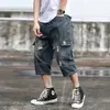 Jeans masculino moderno de corte solto com bolsos cargo, calça cropped personalizada estilo hip-hop, calça pantalona fluida, shorts masculinos retos
