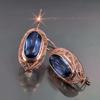 Pendientes de lujo estilo bohemio Cao Shi, pendientes de diseño de moda de estilo étnico femenino, explosiones transfronterizas europeas y americanas.