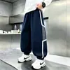 Calça de Moletom Masculina Primavera e Outono 2026 Novo Estilo Crianças Médias e Grandes Calças Largas Soltas Meninos Aconchegantes e Quentes Casuais Longas Roupa de Outono