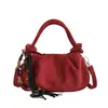 Exquisito bolso retro de gamuza de nicho para mujer, nuevo modelo 2026, bolso cruzado casual versátil, bolso de mano pequeño súper popular