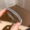Pulseira Oval com Zircônia Banhada a Ouro 18k Real Moda Simples Versátil Anel de Mão Leve Luxo Nicho Toque de Alto Padrão Joia para Mão