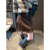 Falda Corta de Moda MQ1983 Estilo Páramo con Cinturón Retro Gamuza Felpa Cintura Alta Adelgazante Borla Longitud Media