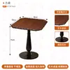 Mesa redonda de madera maciza estilo panadería con sillas tapizadas, diseño minimalista, adecuada para cafeterías, mesas de reuniones, sillas de comedor, ocio moderno y entornos de té de la tarde