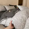 Juego de ropa de cama de cuatro piezas de algodón cepillado Clase A, sábana de algodón puro nueva, funda de edredón, sábana bajera, juego de cama de tres piezas, textiles para el hogar Nantong