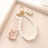Llavero de Perlas Pequeñas Frescas Simple Hecho en Fábrica Pulsera de Perlas con Cinta Creativa Colgante para Bolso Coche