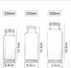 Botella octogonal cuadrada para condimentos al por mayor con tapa de aluminio botella de vidrio transparente botella para bebidas sellada fruta jugo de naranja té con leche bebida fría levadura